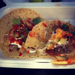 Duk tacos so good I couldn't wait to take a bite