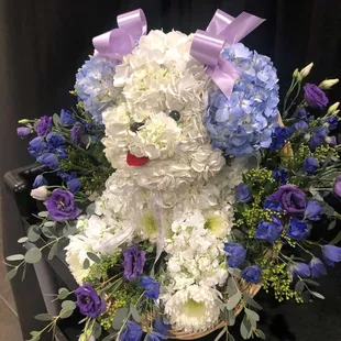 Photo provided by Duke City Floral of custom-ordered arrangement for my friend&apos;s funeral.