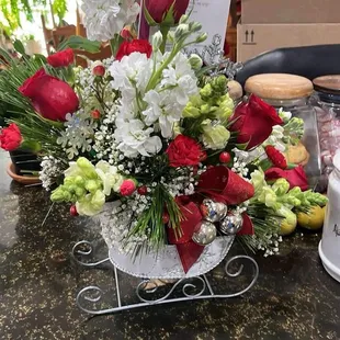 Beautiful holiday sleigh arrangement