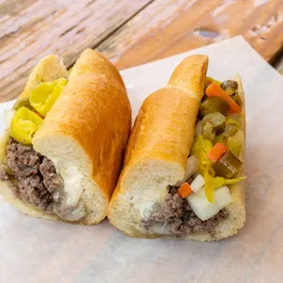 The Original Denver Chopped Cheese! Ground beef, topped with onions, pepperoncini, and mayo, served on a buttered hoagie roll!