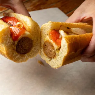 Sausage Sandwich! Mild Italian sausage, provolone cheese, roasted onion, and bell pepper on a hoagie roll!