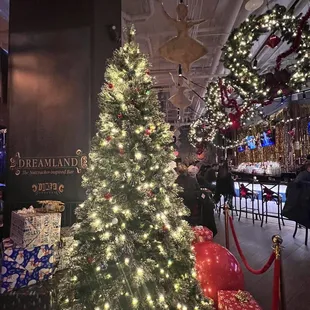 a christmas tree and presents