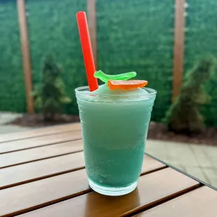 a drink with a straw in a glass