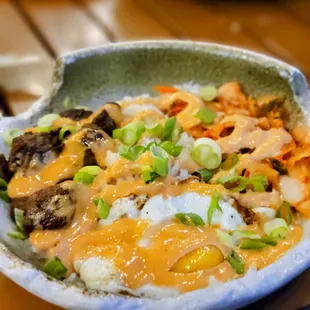 a bowl of rice and vegetables