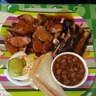 Enjoyed a two meat and a three meat plate.  Ribs, beef, and links; very flavorful with a side of tasty potatoe salad and beans.