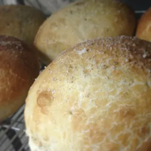 a close up of a bunch of bread buns