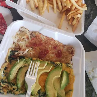 Spinach Avocado omelet + Fries are great! Nice service and great food
