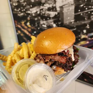 Pastrami burger with house made garlic aioli and honey mustard