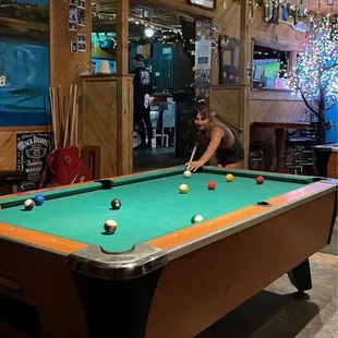 a man playing pool