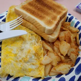 Western omelette with home fries and toast.