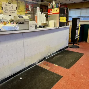 the counter area of a fast food restaurant