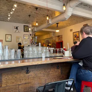 a man sitting at a bar
