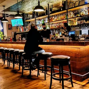 a man sitting at a bar