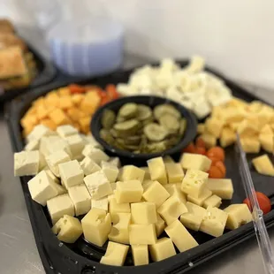 a tray of cheese and crackers