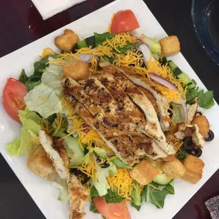 Awesome grilled chicken salad with homemade dressing.