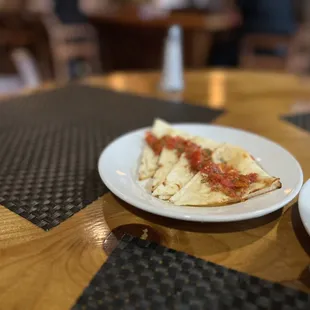 A gift from the chef: pita with some kind of marinara sauce.