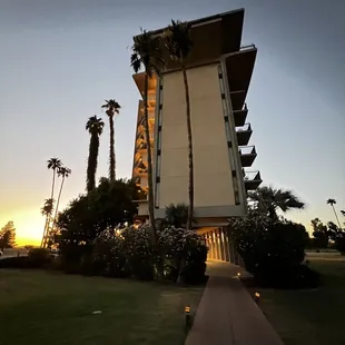 A hotel in an oasis in the middle of the desert.