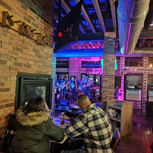 Facing the front of the bar.