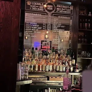 a bar with liquor bottles on the counter