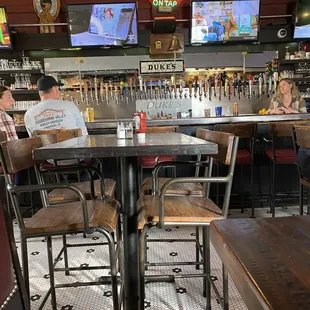 customers sitting at the bar