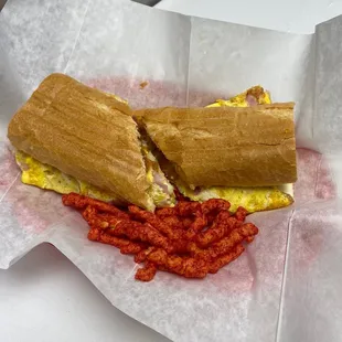 Yuri sandwich ham egg and cheese with hot Cheetos!