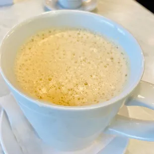 a cup of coffee on a saucer