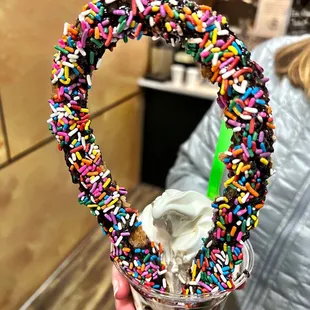a chocolate milkshake with sprinkles