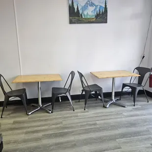 two tables and two chairs