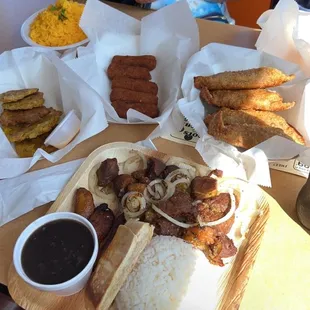 Pork chunks, empanadas, croquettas, tostones