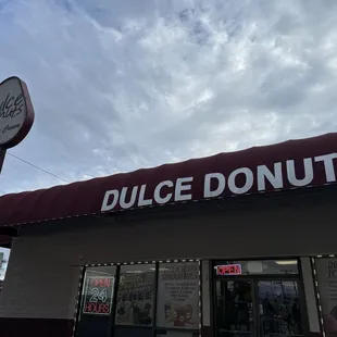 the outside of a dulce donuts store