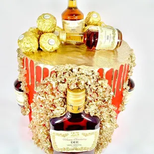 a cake with a bottle of liquor