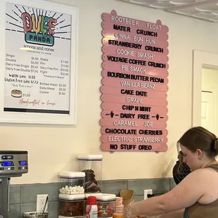 This photo shows what they have to offer, and the worker making the delicious ice cream waffle bead cup.