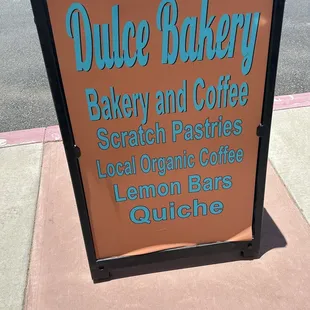 a sign for dulce bakery and coffee