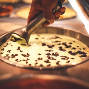 a person making a dessert