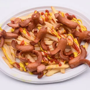 a plate of hot dogs and french fries