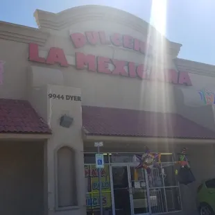 a car parked in front of the store