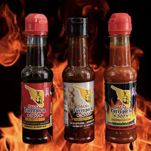 three bottles of hot sauce