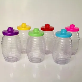 a row of plastic baby bottles