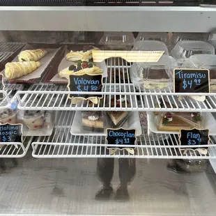 a display of sandwiches and pastries