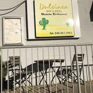 Sign and outdoor seating