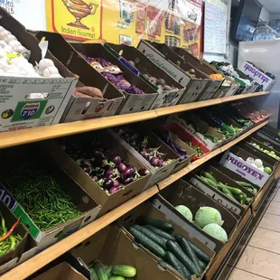 a grocery store filled with vegetables
