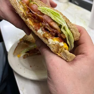 Cheese, bacon, lettuce, tomato, jalapeño breakfast sandwich