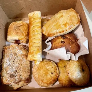 a variety of pastries in a box