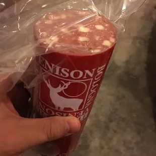 a person holding a cup of coffee