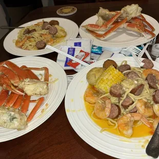 2 lbs snow crab, 1/2 lb shrimp, 1/2 lb sausage, 1 corn, 1 potato and noodles