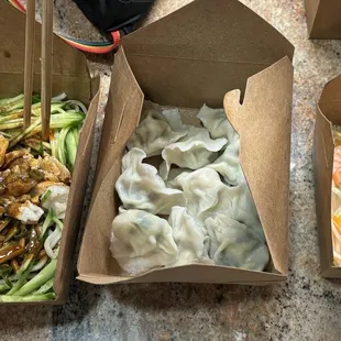 Szechuan noodles, shrimp and chive dumplings, Thai papaya salad.