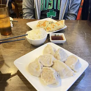 C14. Chicken Dumpling  C4. Roast Beef with Scallion Pancake White rice