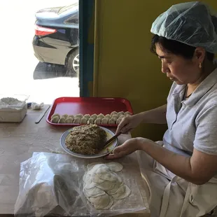 Dumplings being made on the spot.