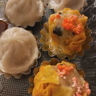 Pork 4 Piece Steamed Sui Mai and 6 Piece Shanghai Soup Dumpling with Pork (half-eaten lol)