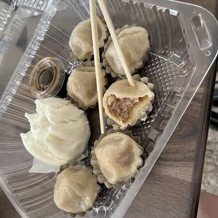 Housespecial 6 Piece Shanghai Soup Dumpling with Pork and a BBQ Pork Bun